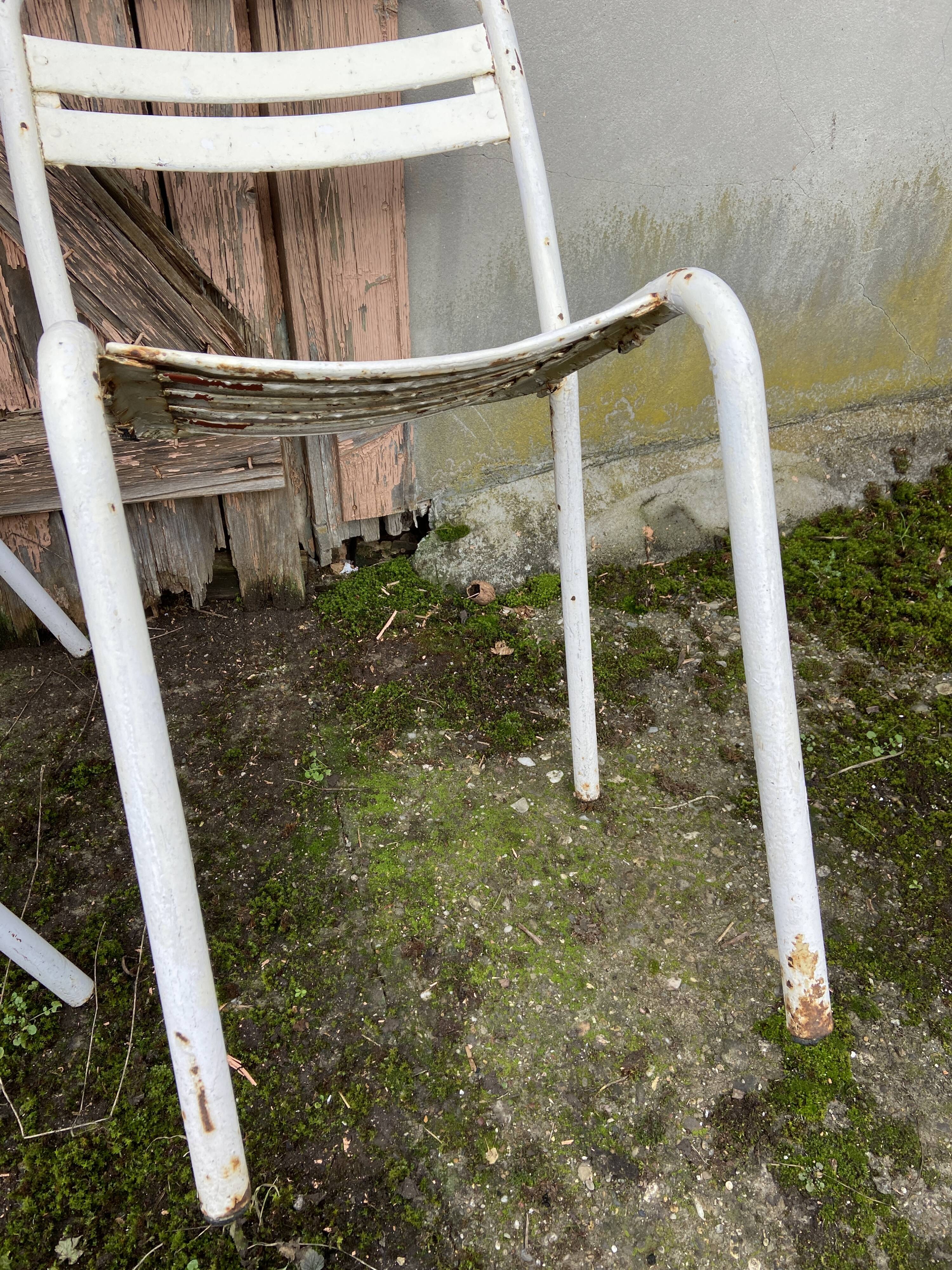 Duo of vintage metal Tolix chairs