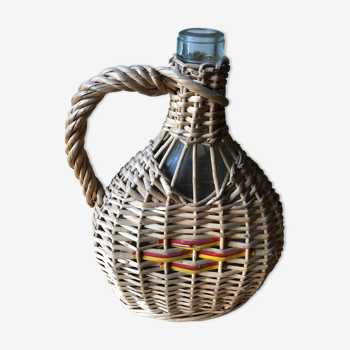 Glass and rattan bottle