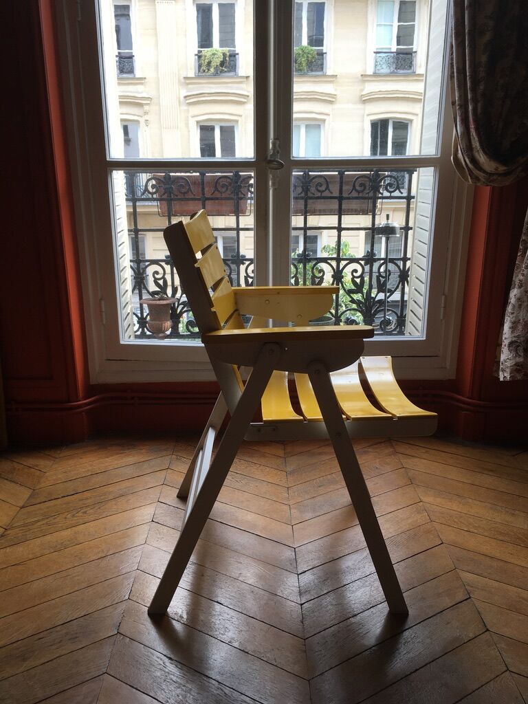 Vintage foldable wooden armchair