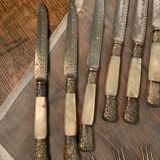 Set of coat of arms fruit cutlery