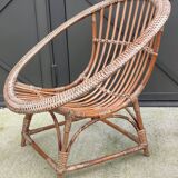 Vintage rattan shell basket armchair