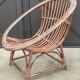 Vintage rattan shell basket armchair