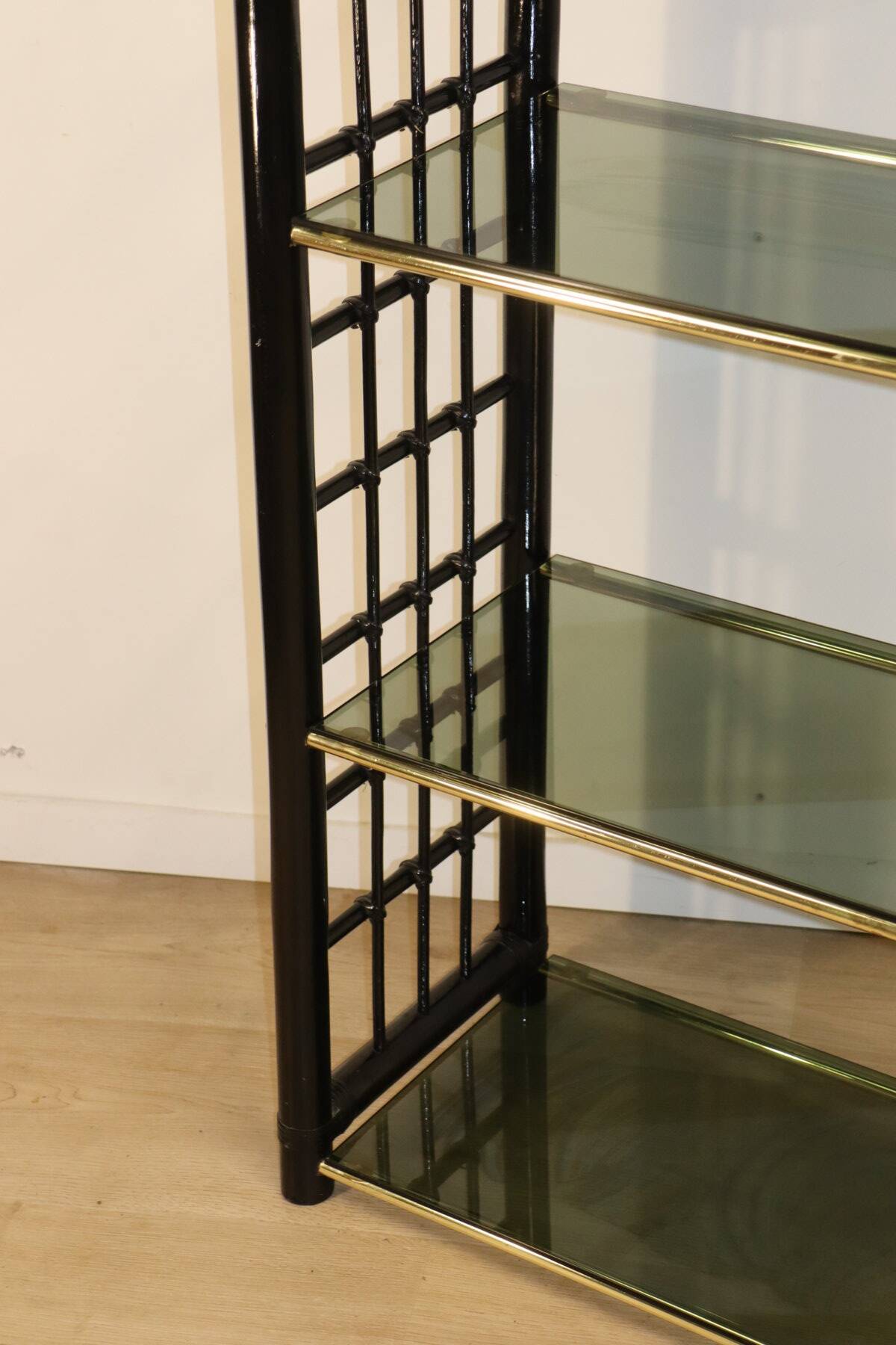 Vintage 1970s shelf in smoked glass with a bamboo-style structure.