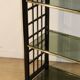 Vintage 1970s shelf in smoked glass with a bamboo-style structure.