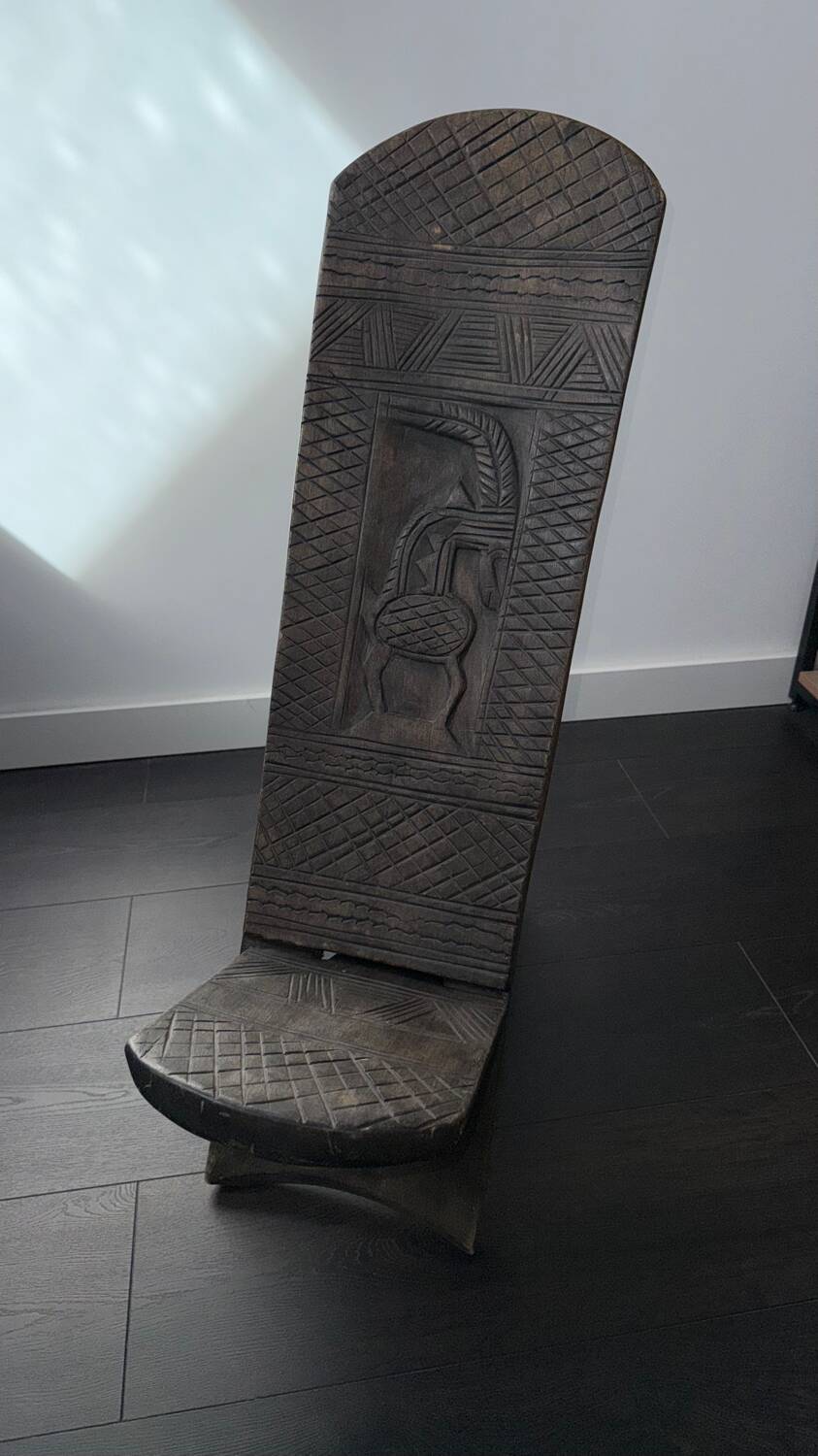 Traditional African carved wooden chair