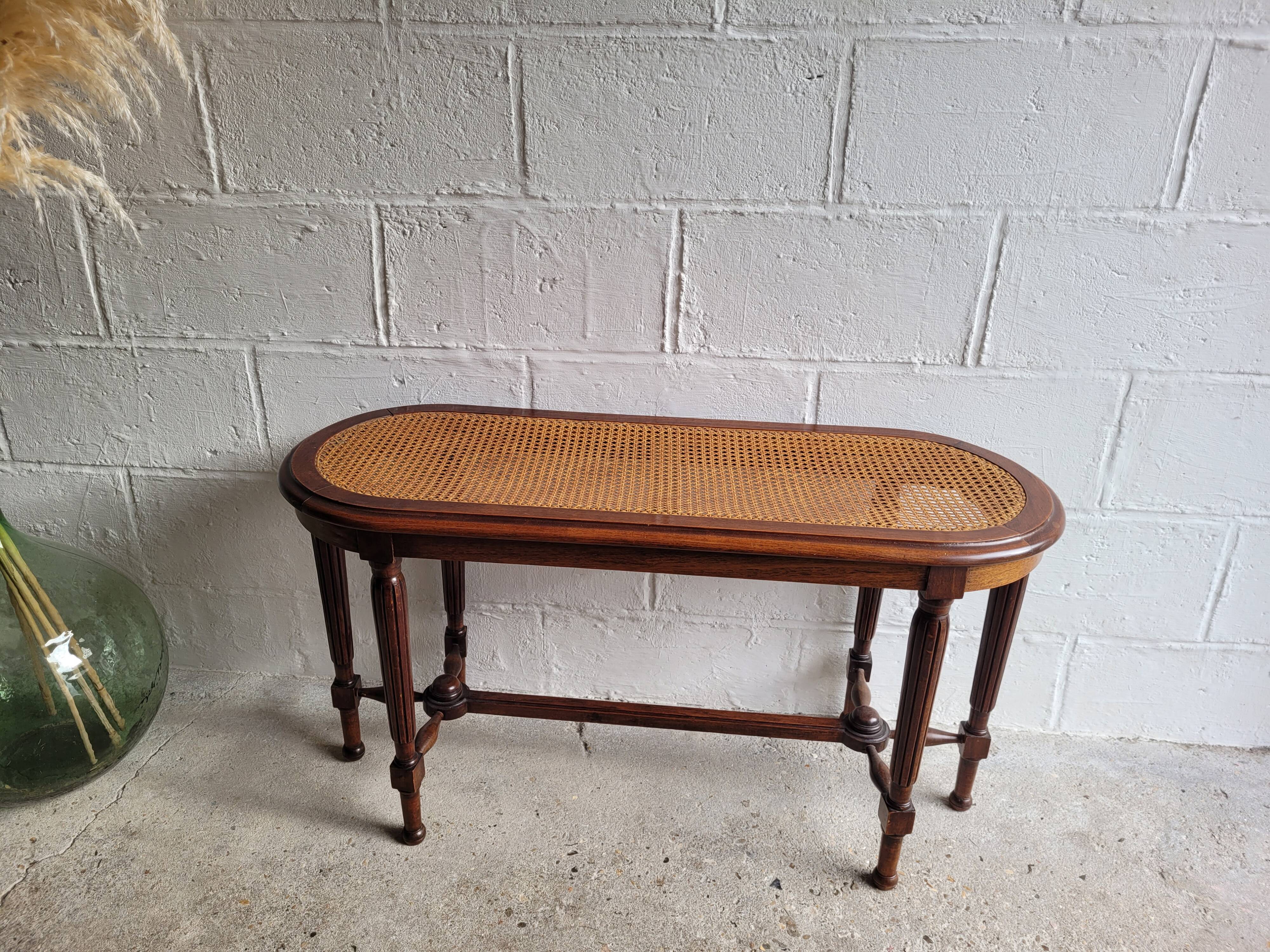 Wooden piano bench and cannage