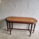 Wooden piano bench and cannage