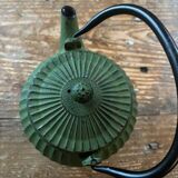 Green cast iron teapot