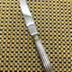 Small silver-plated Christofle knife, Aria model with gold rings