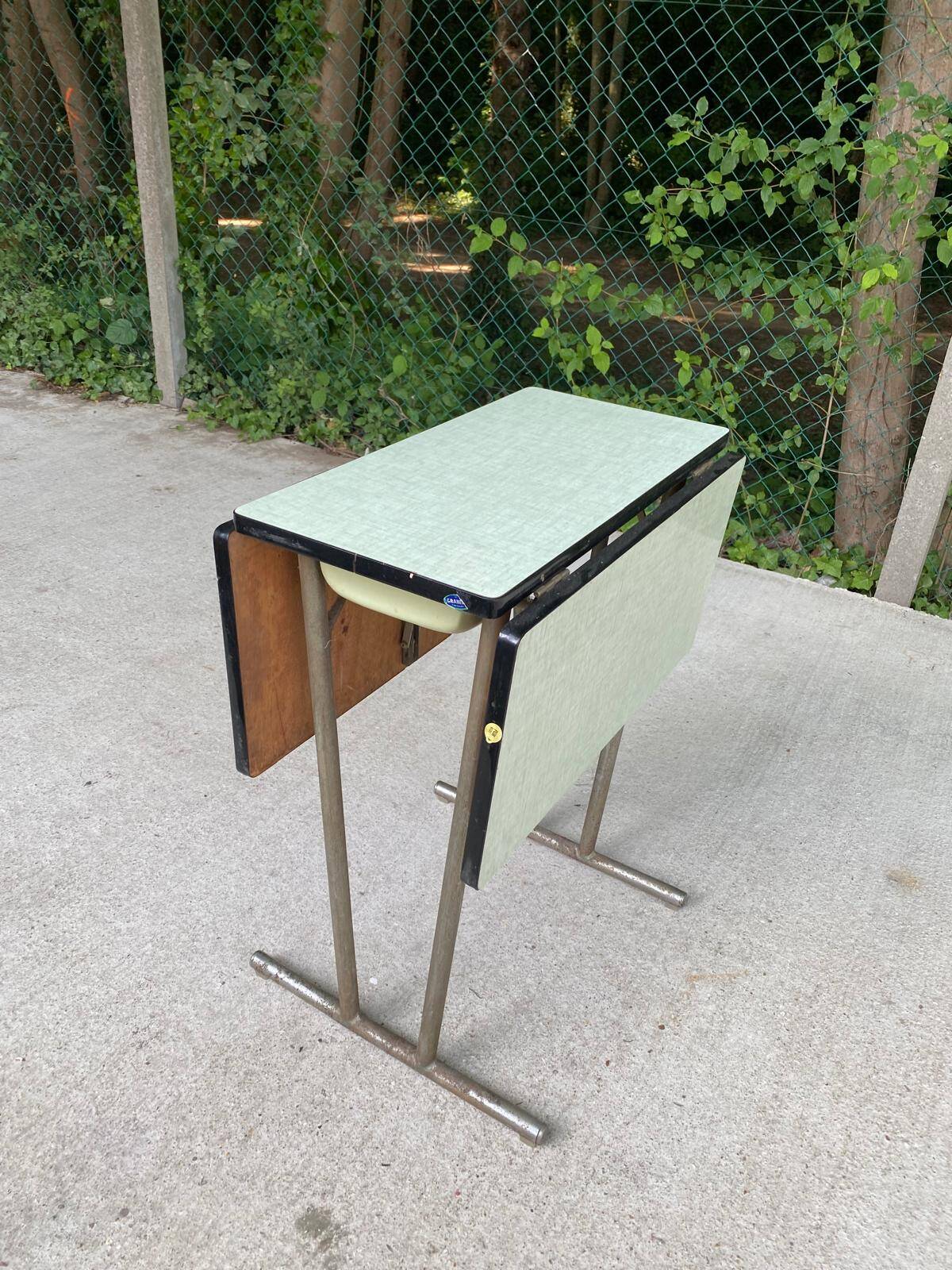Folding and extending kitchen table in steel and aqua green wood