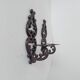 Antique wall candle holder in enamelled cast iron