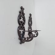 Antique wall candle holder in enamelled cast iron