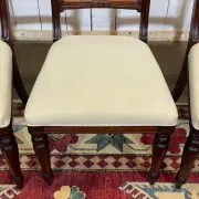 Set of 2 armchairs and 6 English mahogany chairs from the 1950s.