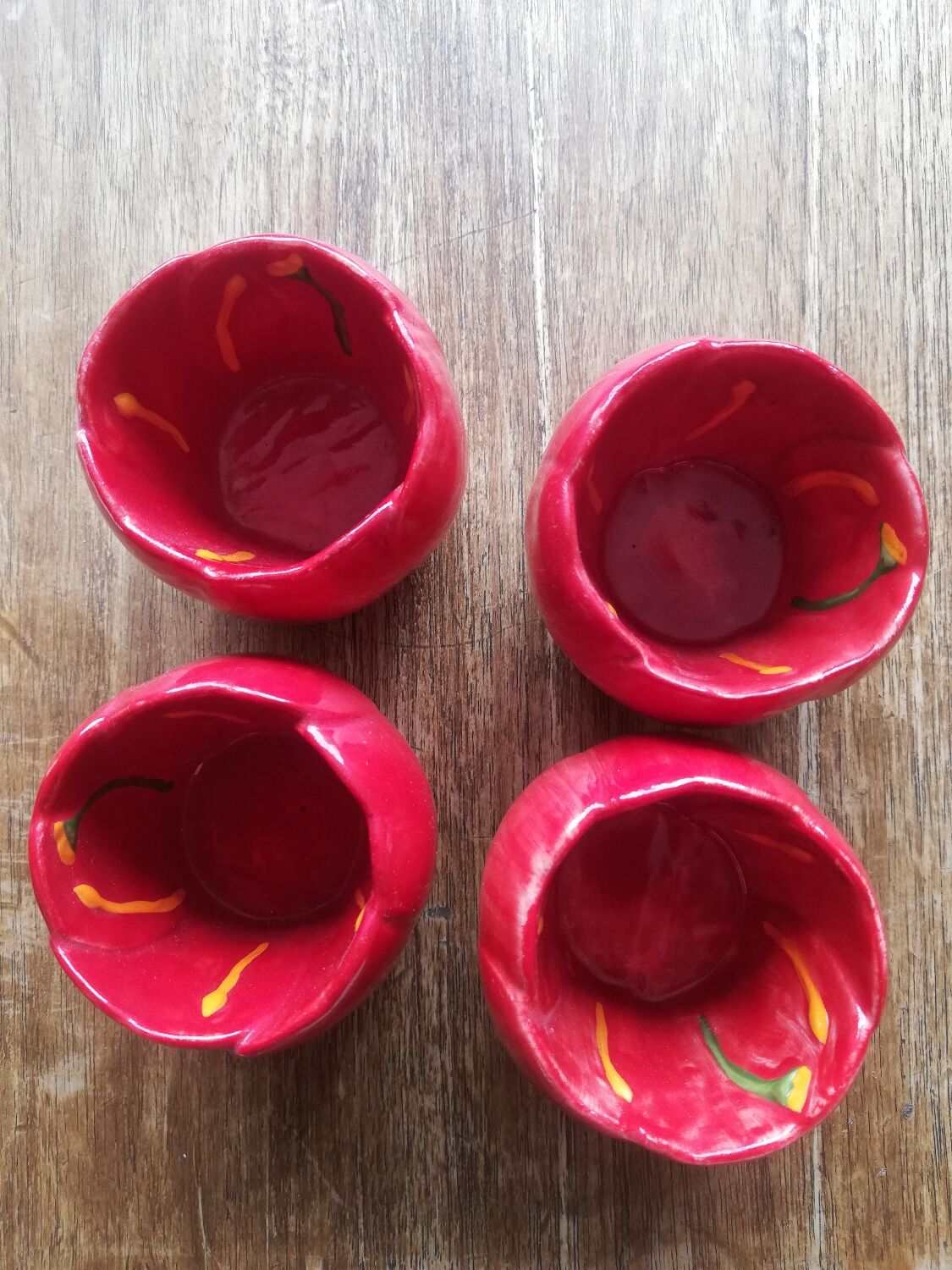 Set of 4 red tulip bowls by Villeroy & Boch.