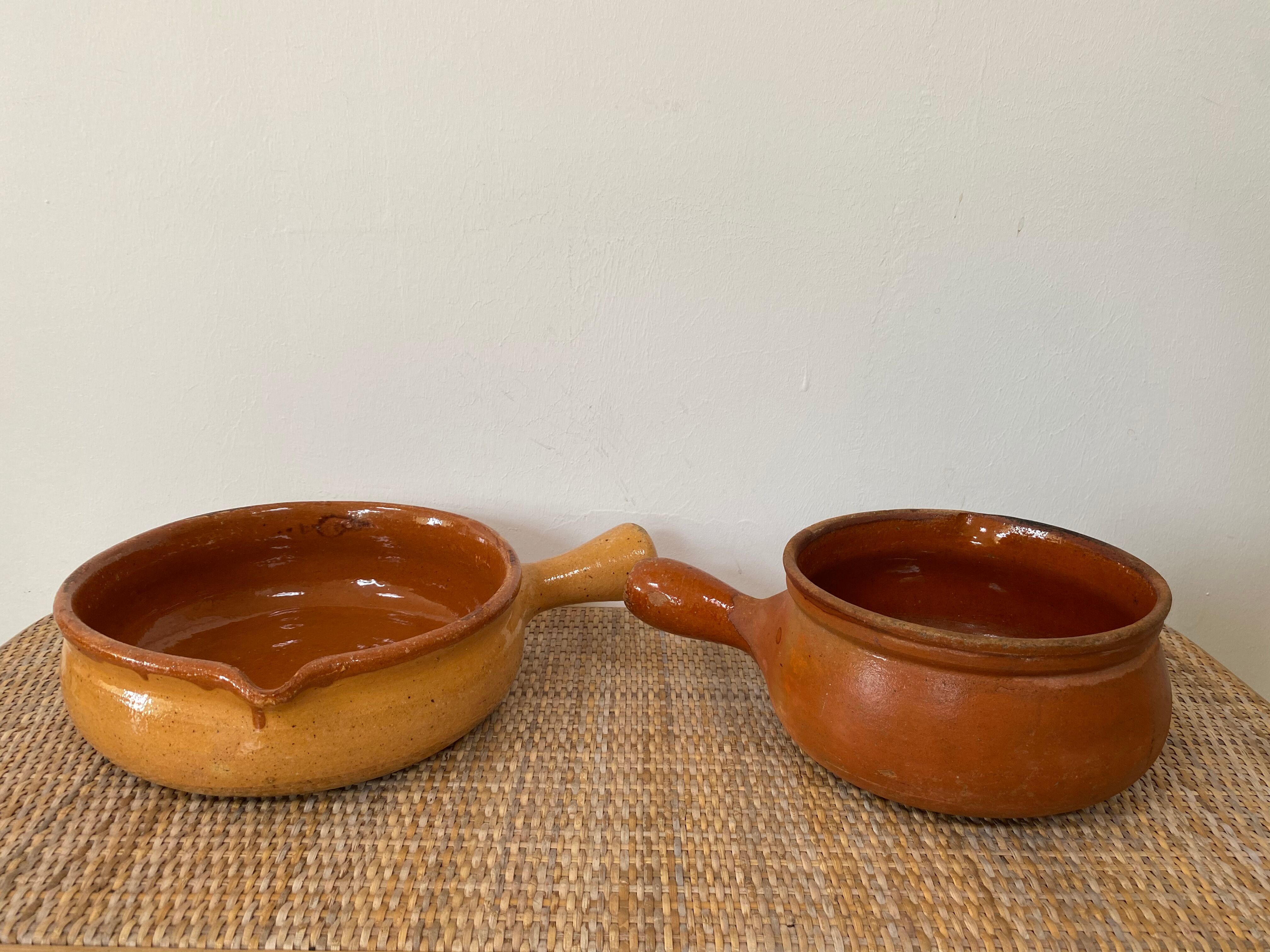 Pair of old pocket pots in glazed stoneware