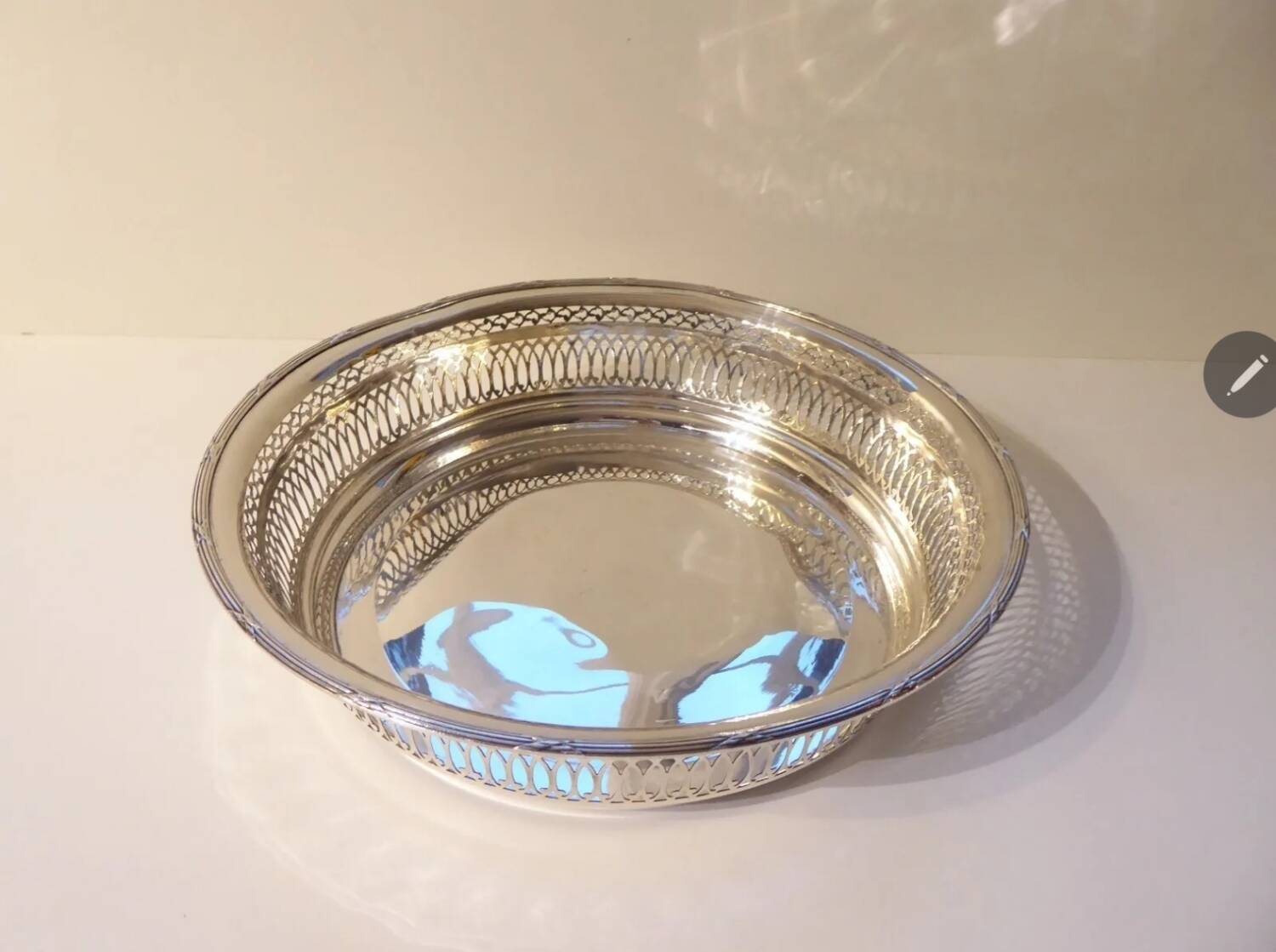Large openwork basket in silver metal