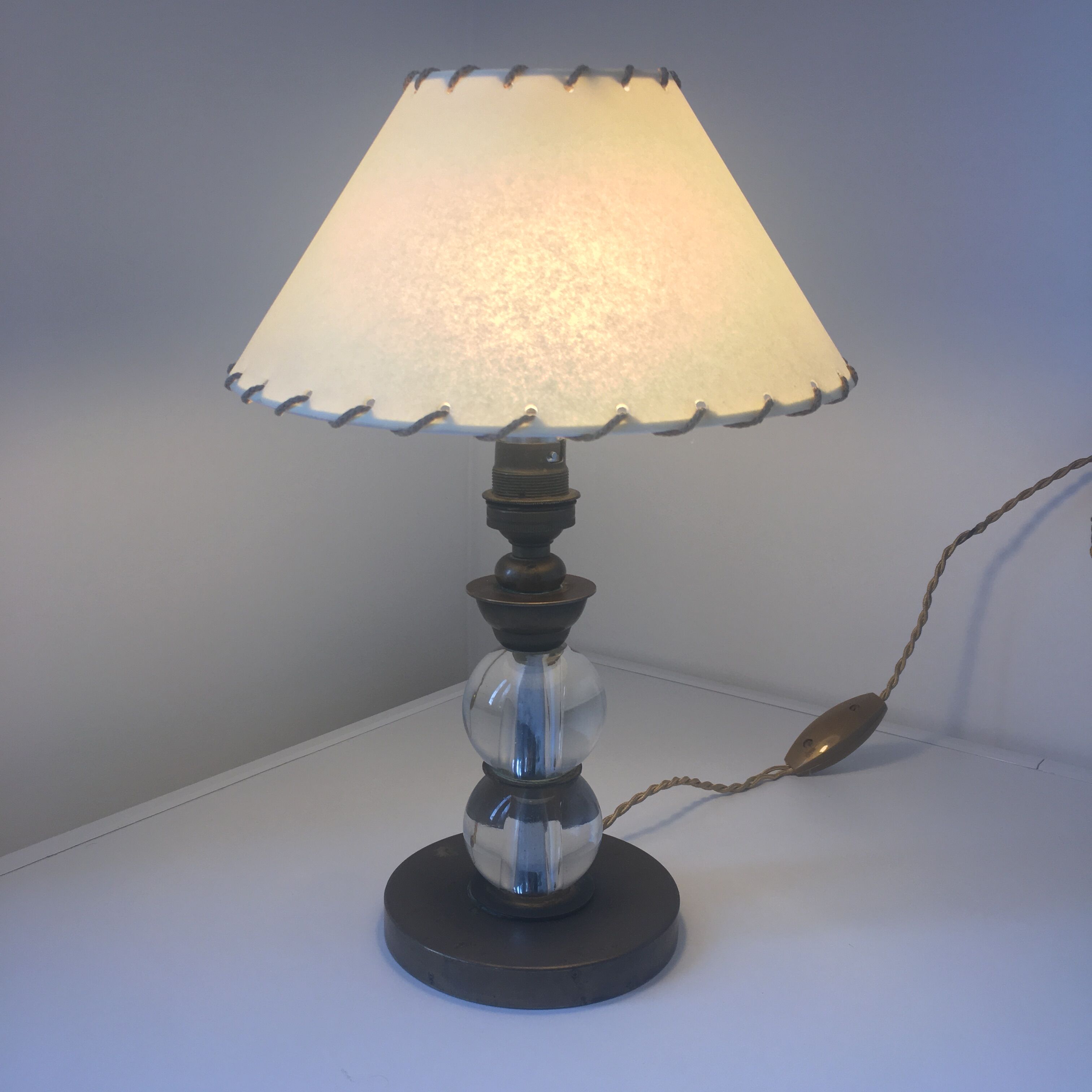 Modernist-era glass and brass lamp