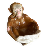 Pipe holder, ashtray or monkey pocket emptier