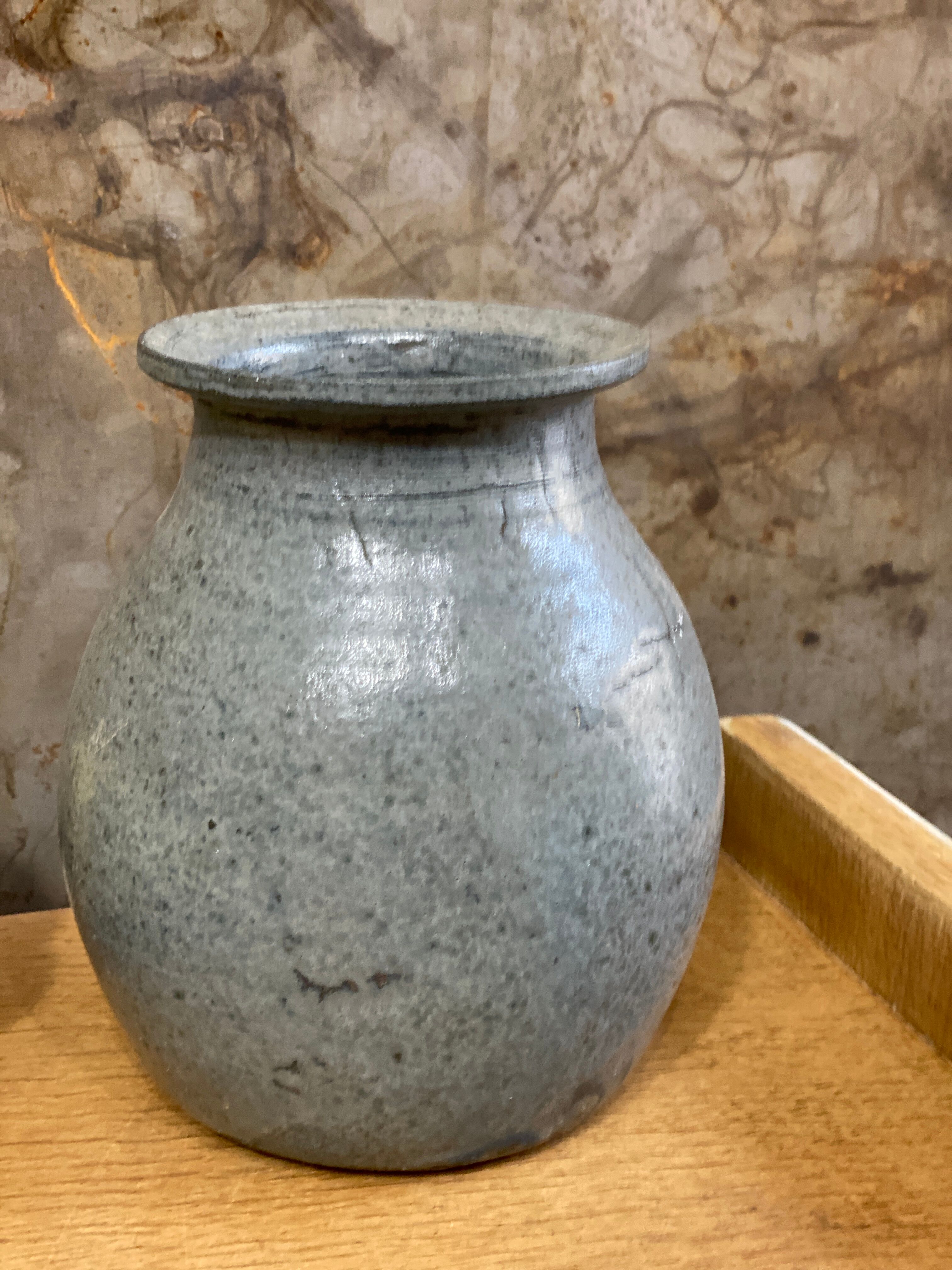 Old bluish grey ceramic vase