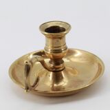Old brass hand candle holder