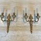 Suite de 4 appliques en bronze de style Louis XVI