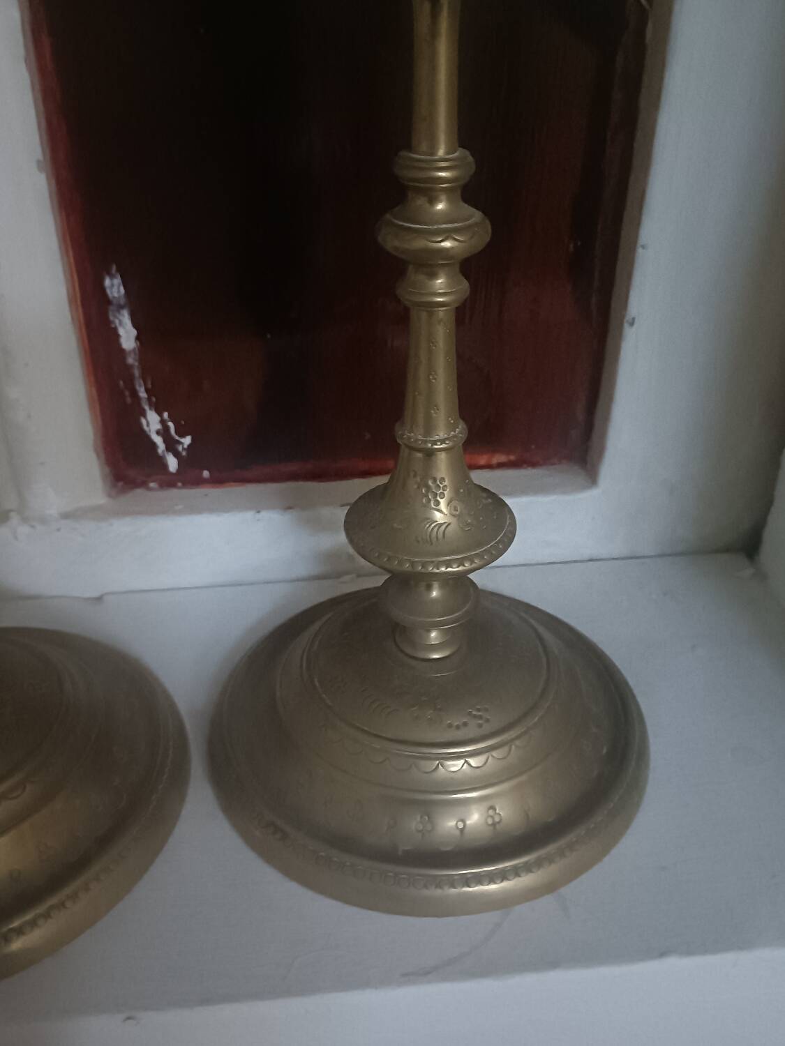 Pair of chiselled candlesticks
