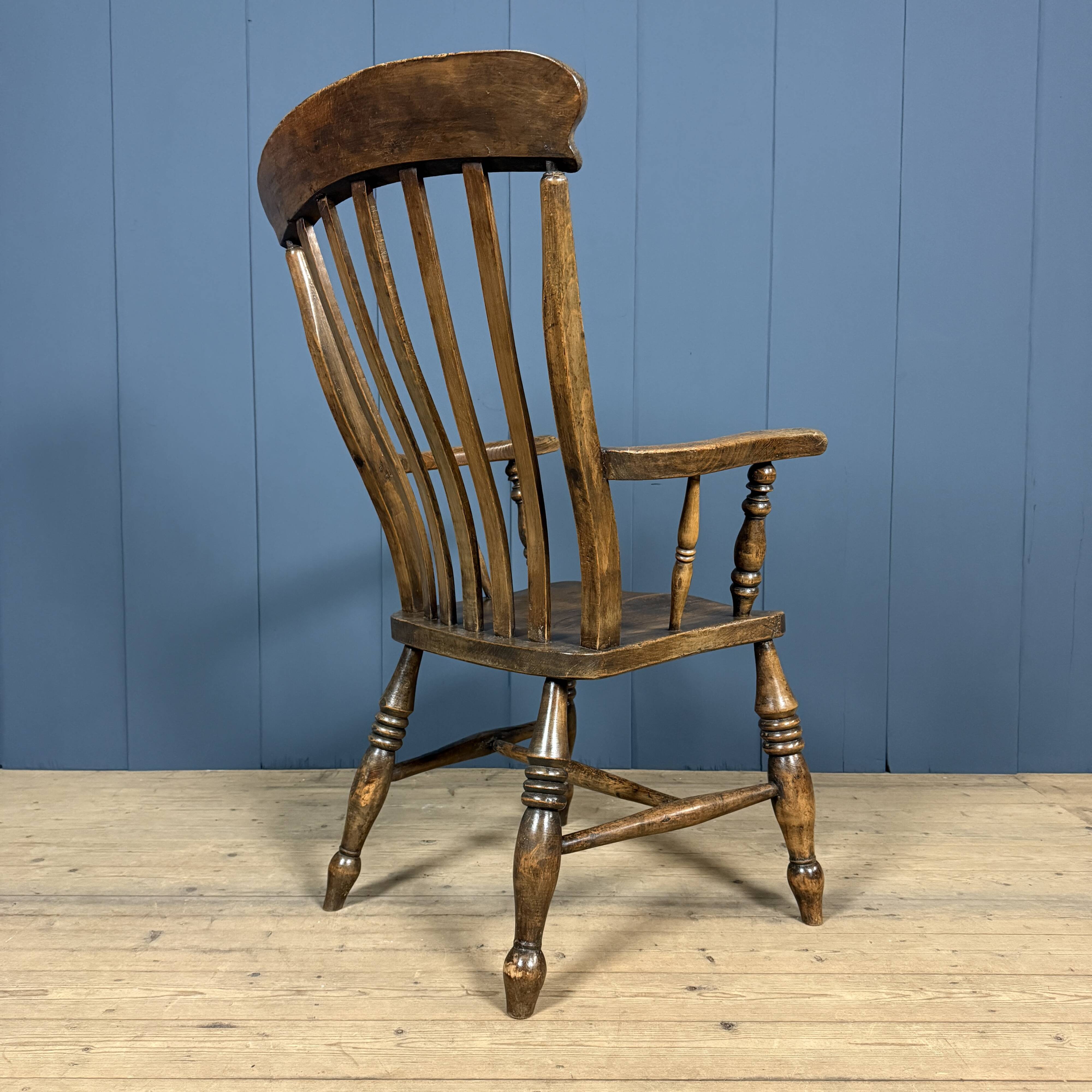 Brown English Windsor armchair with high back