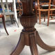 Round extendable dining table for six people, mahogany.