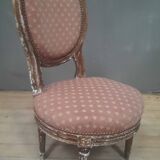 Chaise basse de style Louis XVI