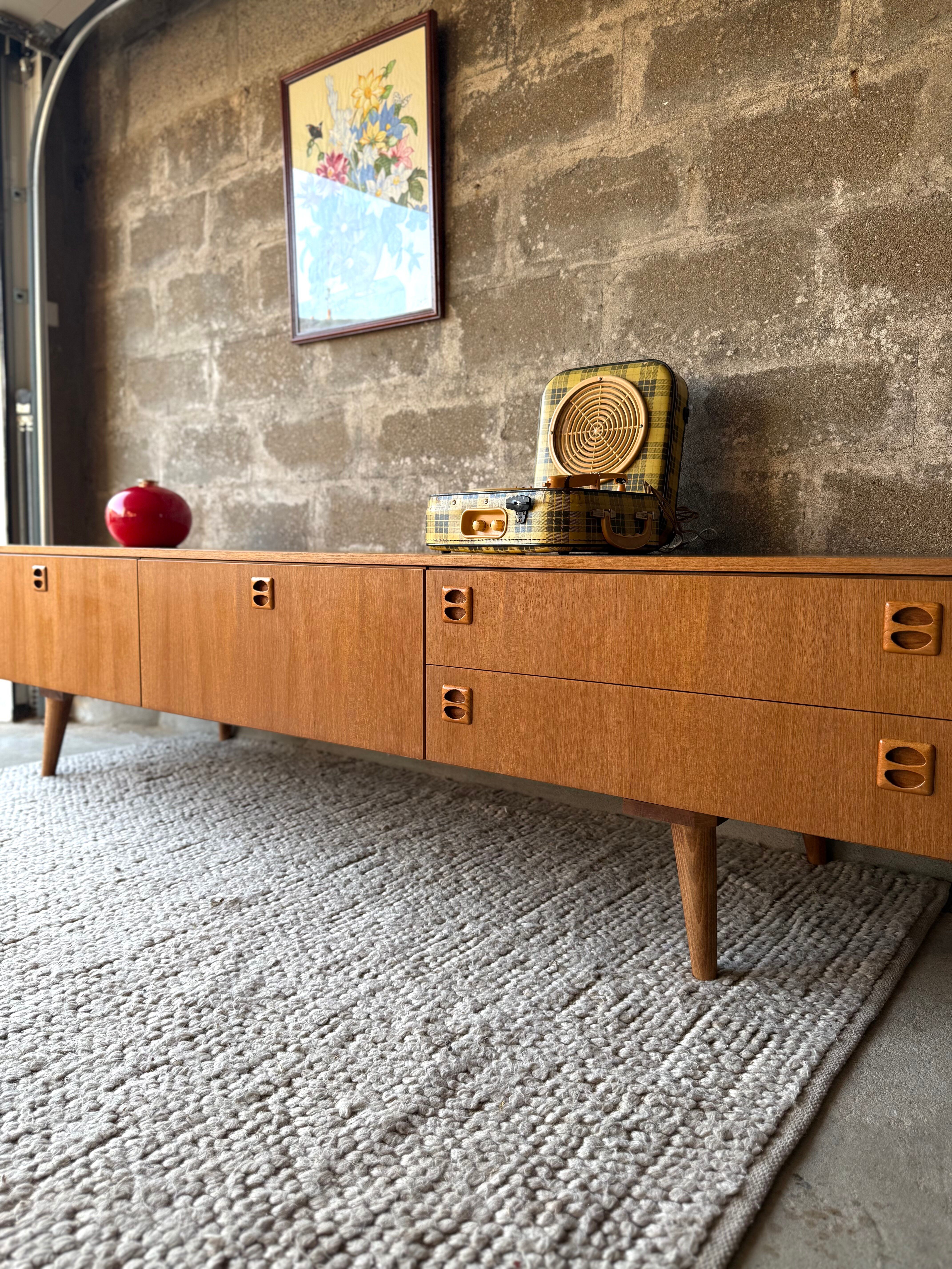 Scandinavian low sideboard in teak, 1970.