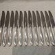 12 silver-plated metal table knives by Christofle Albatros, 24.7 cm.