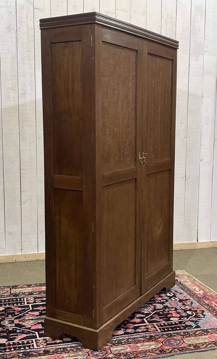English oak wardrobe from the early 20th century.