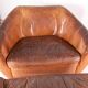 Grands fauteuil et ottoman en cuir