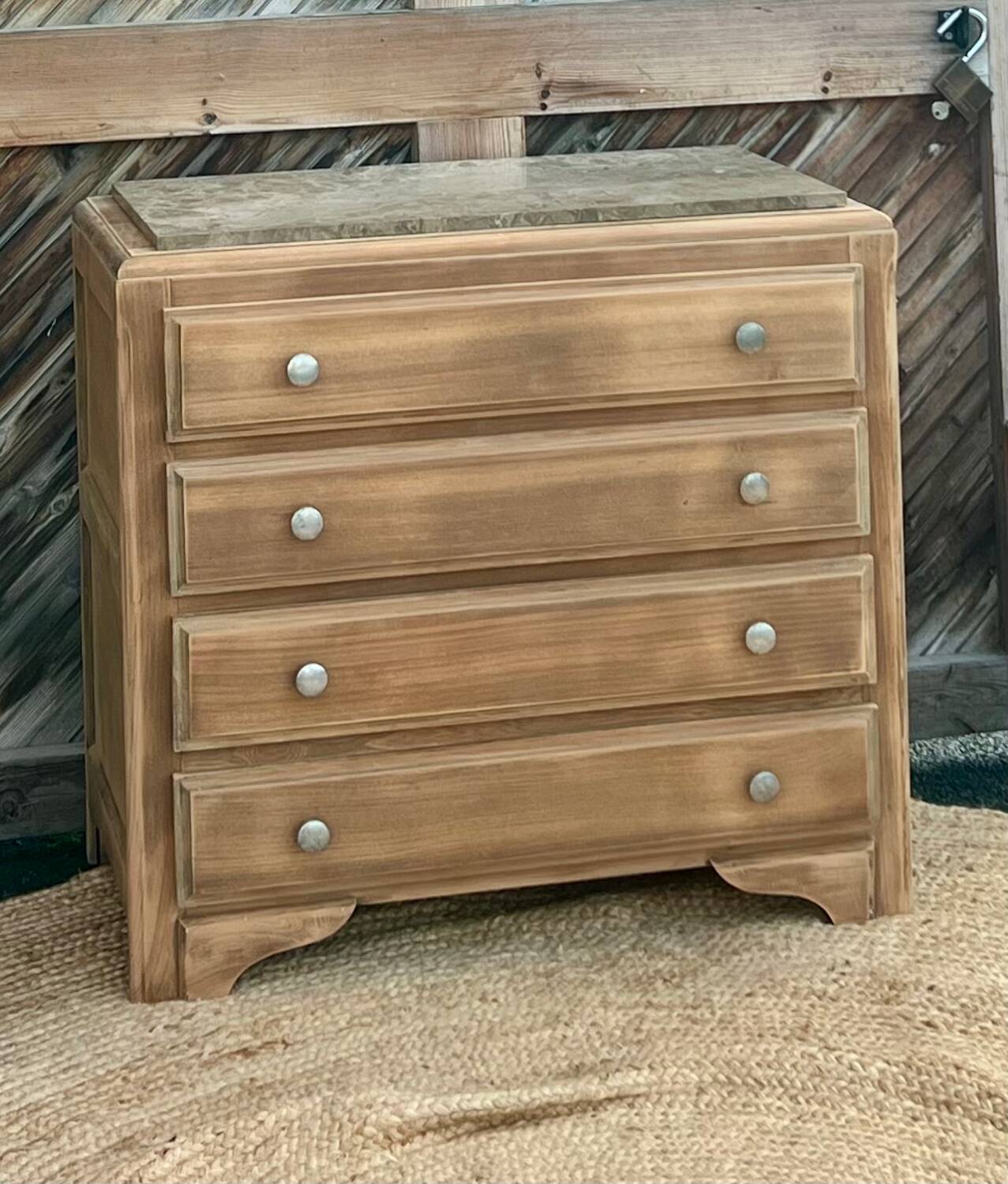 Antique wooden commode with beige marble.