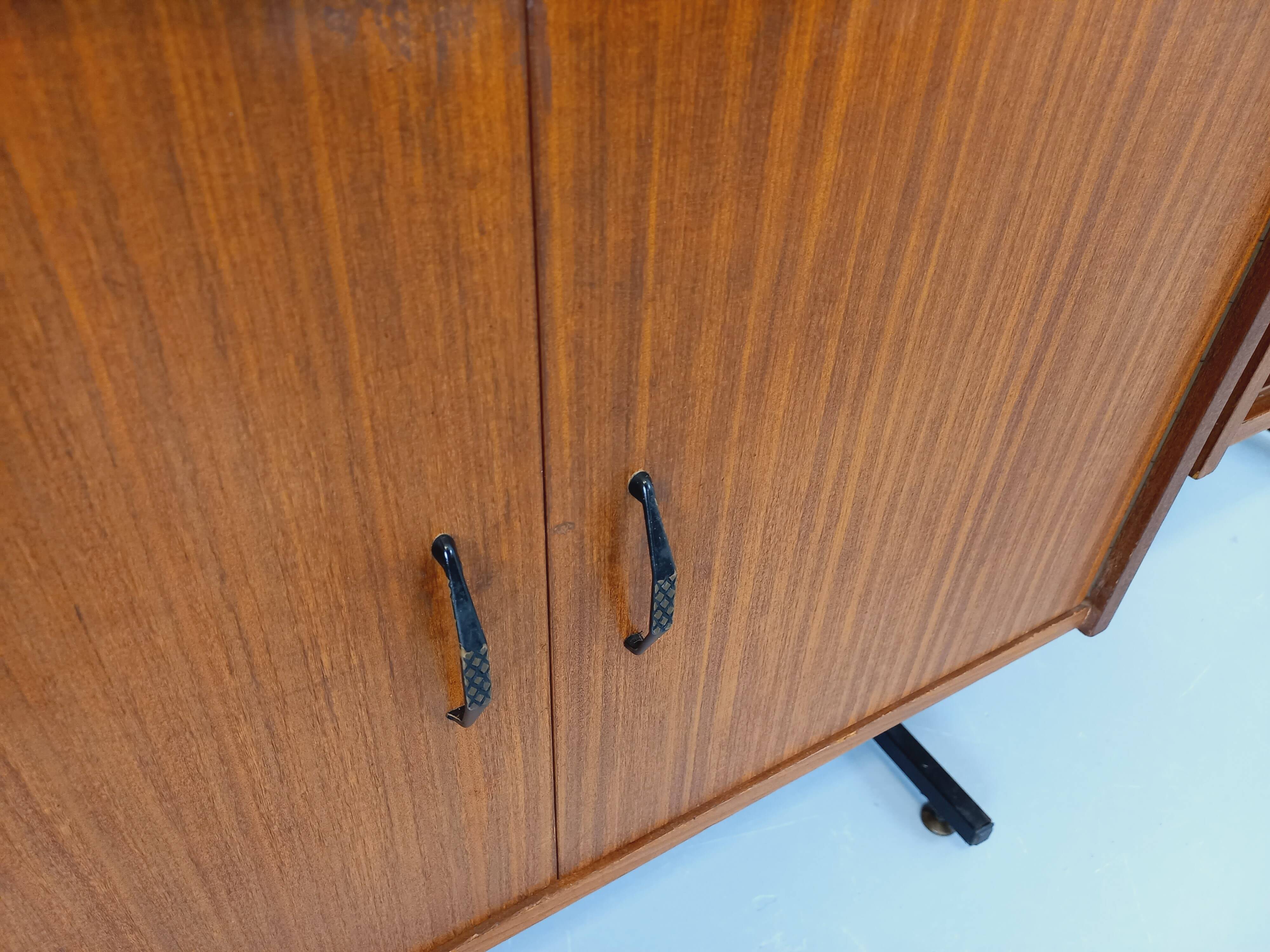 Vintage Italian double modular bookshelf in teak and metal.
