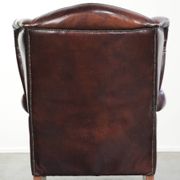 Fauteuil à oreilles en cuir de vache confortable dans le style anglais