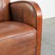Sheepskin armchair in Art Deco style with wooden armrests