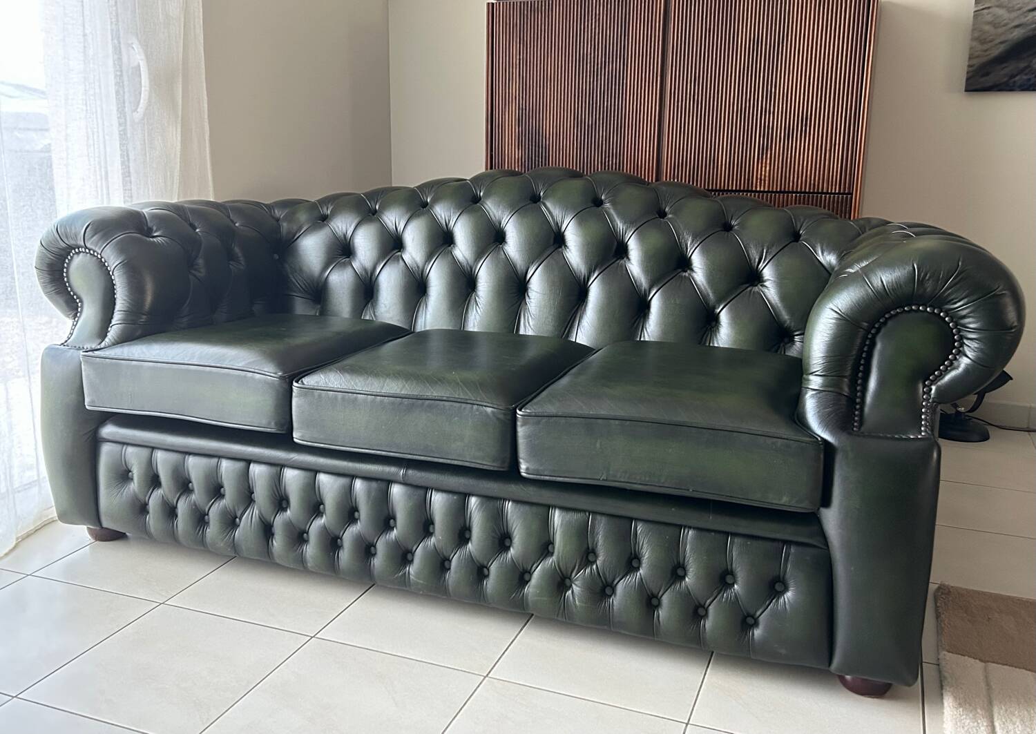 three-seater Chesterfield sofa