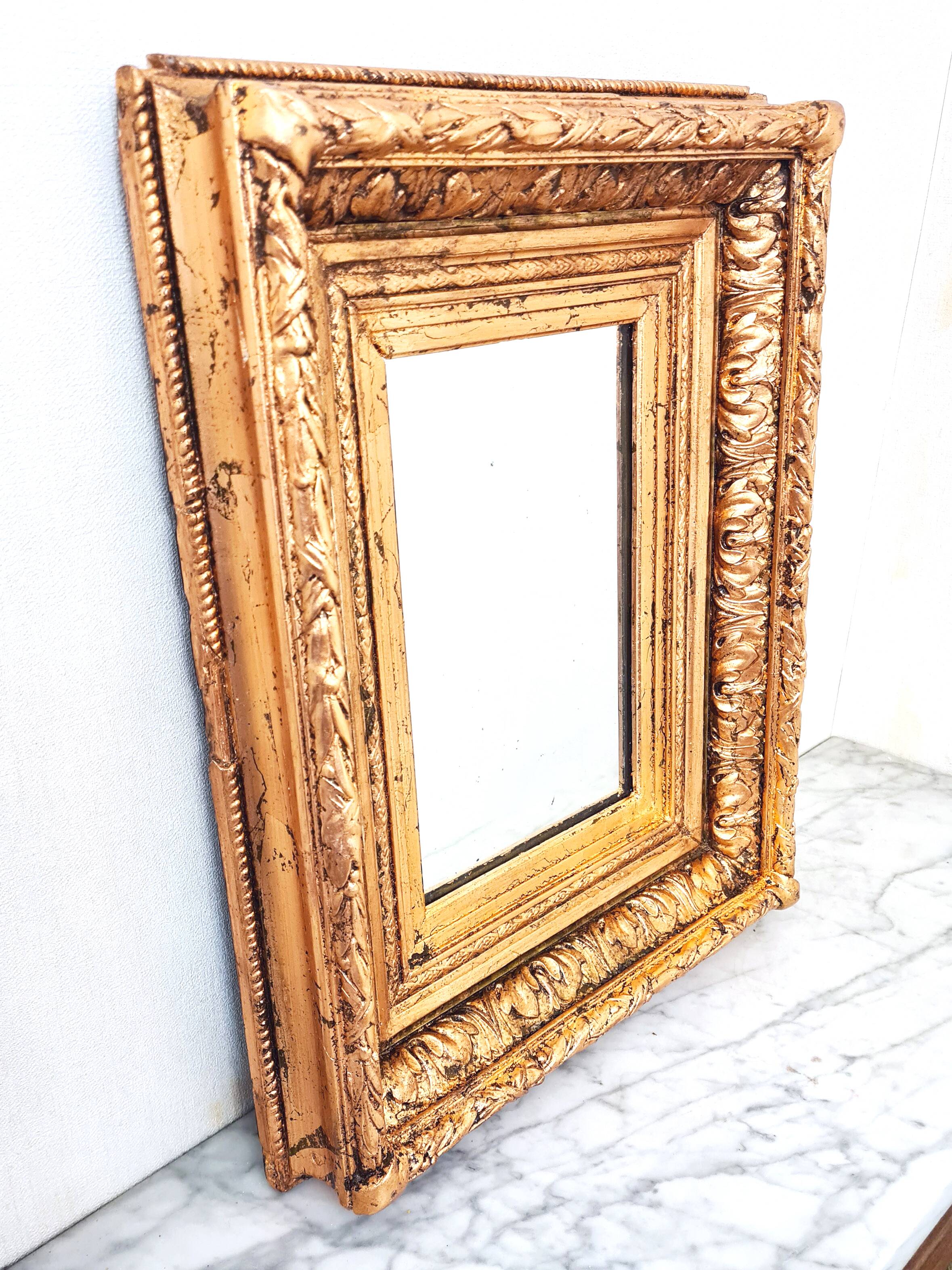 Napoleon III mirror, Wood and stucco, Gilded with copper leaf.