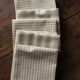 Lot 6 gingham cotton napkins and beige linen tiles
