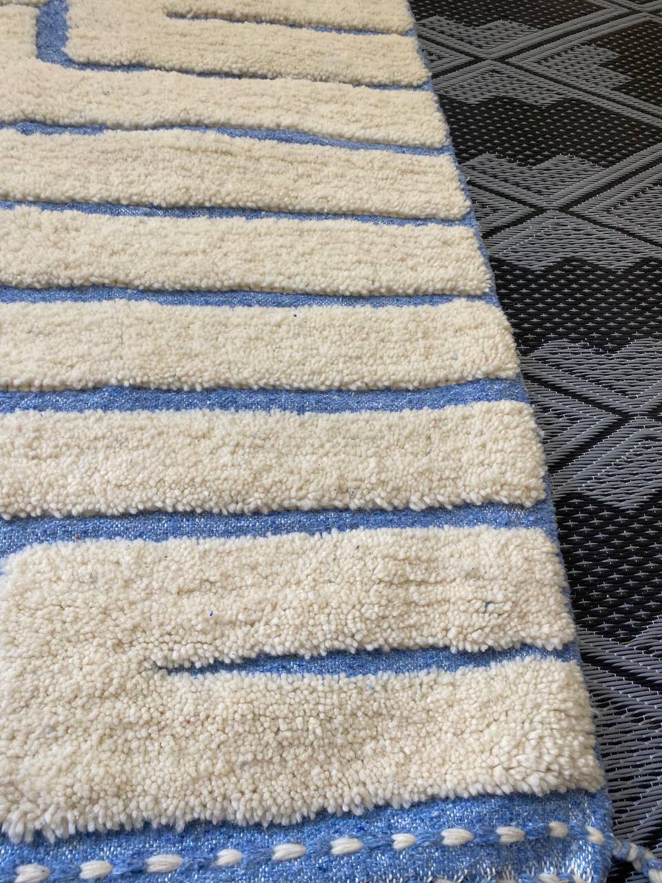 Sky Blue Boujaad Rug – Handmade Moroccan Wool Rug with Bold White Geometric Patterns