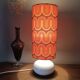 Two lamps with a seventies psychedelic wave print.