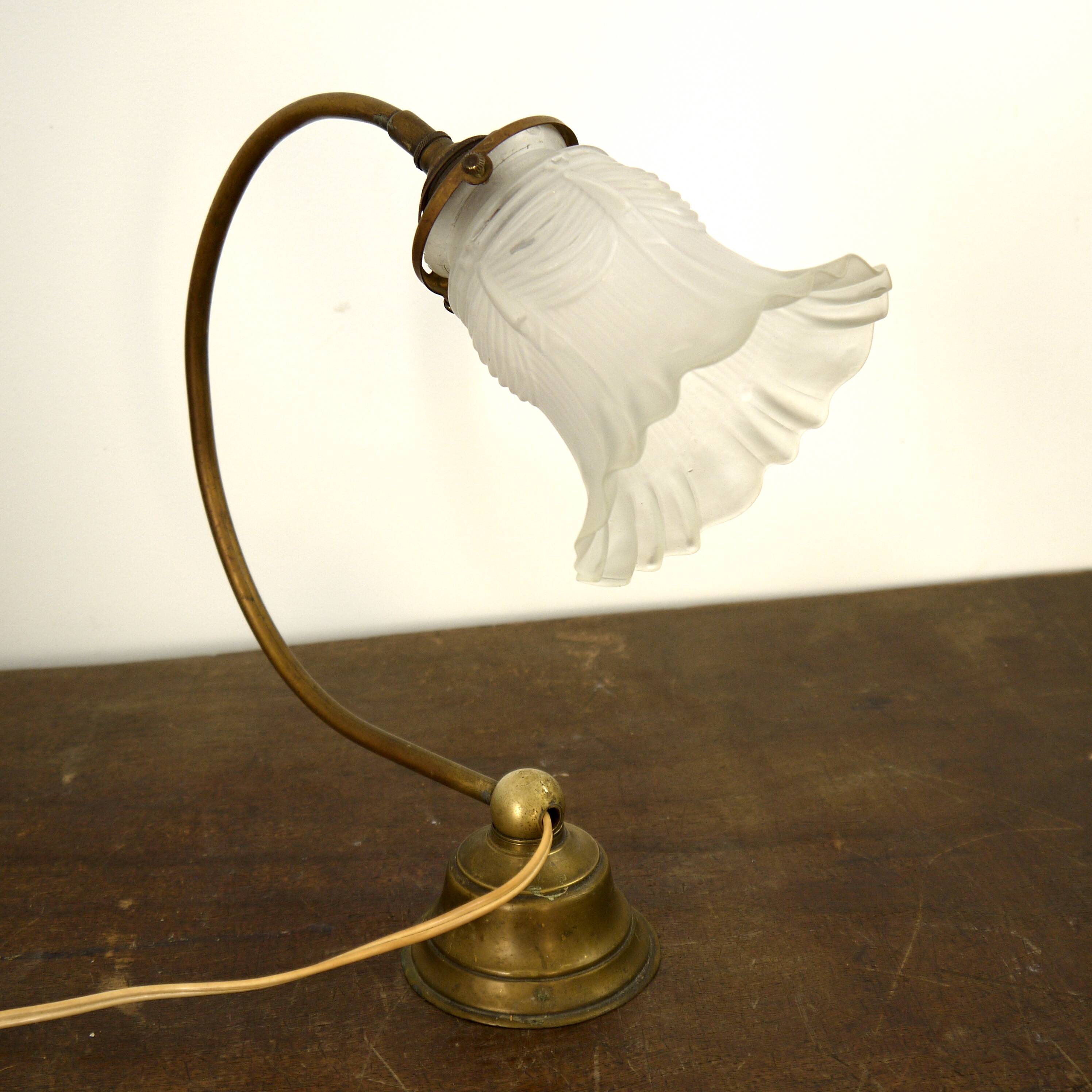 Brass lamp with glass globe