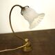 Brass lamp with glass globe