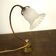 Brass lamp with glass globe