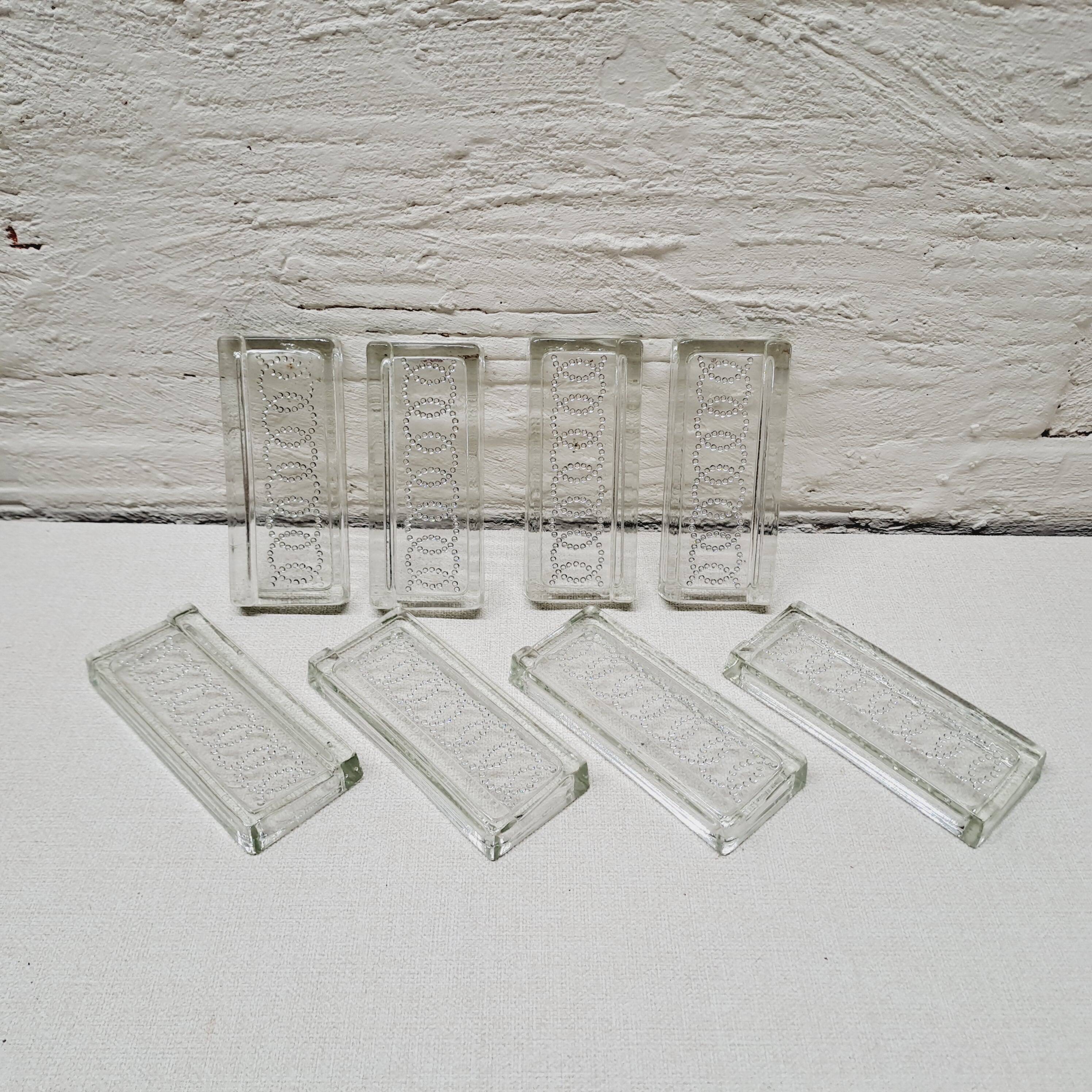 Set of 8 chiseled glass knife holders