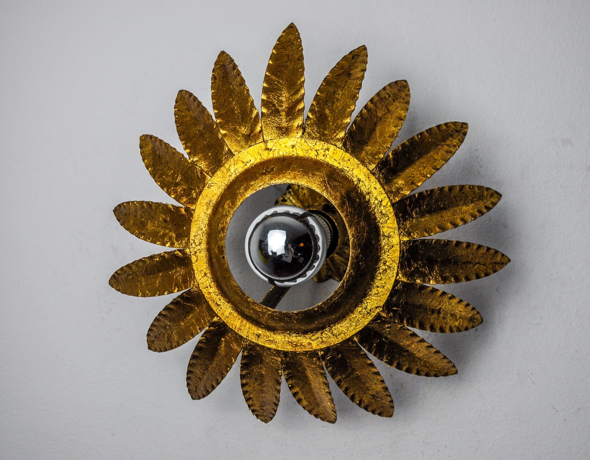 Sun wall lamp by ferro arte, metal and gold leaf, Spain, 1960