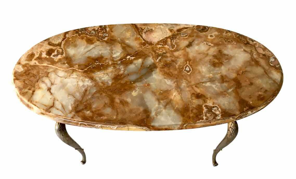 Oval coffee table in onyx and brass 1950
