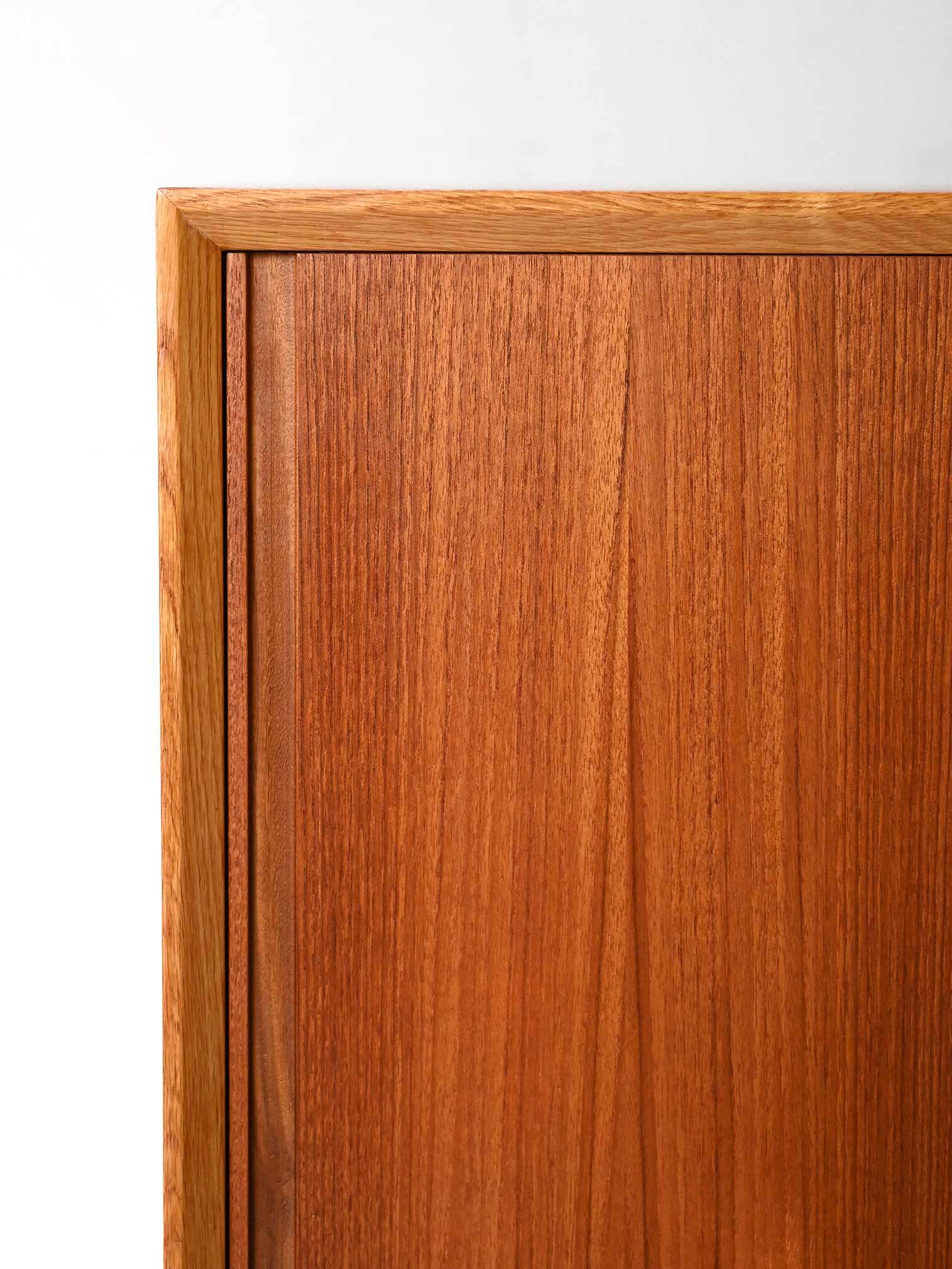 Vintage Scandinavian teak sideboard with metal-lined drawers