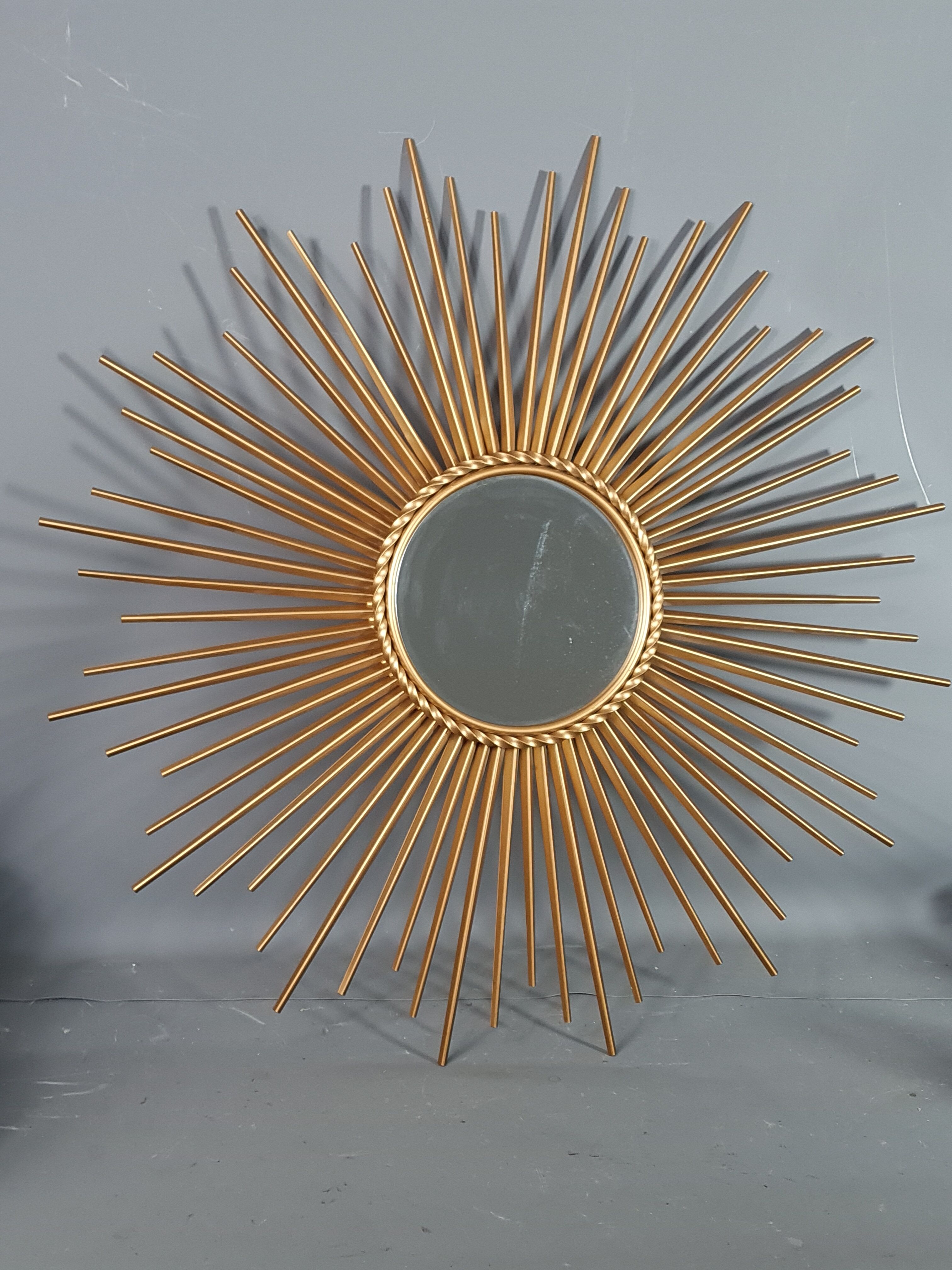 Miroir soleil Chaty à Vallauris métal doré 70 cm SB